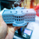 Large-scale 3D printer constructing a concrete building structure on-site
